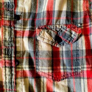 Button down flannel with two front pockets with a surprising amount of space